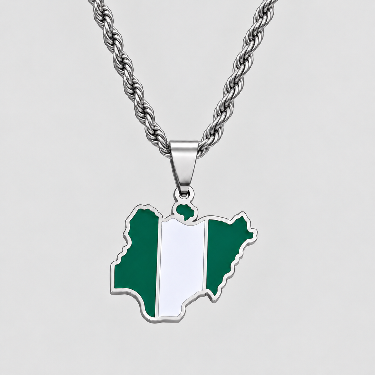 GRISÉ NYC silver Nigeria flag map pendant necklace featuring green and white enamel detailing on a 3mm silver rope chain.