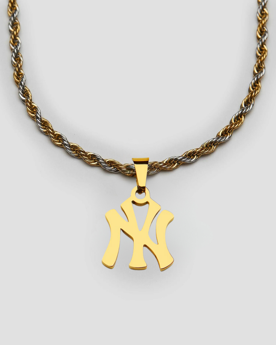 GRISÉ NYC NY Yankees pendant necklace in 18k gold plated stainless steel on 2 tone rope chain.