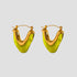 Flat lay of GRISÉ NYC olive resin V-shape 18k gold plated earrings
