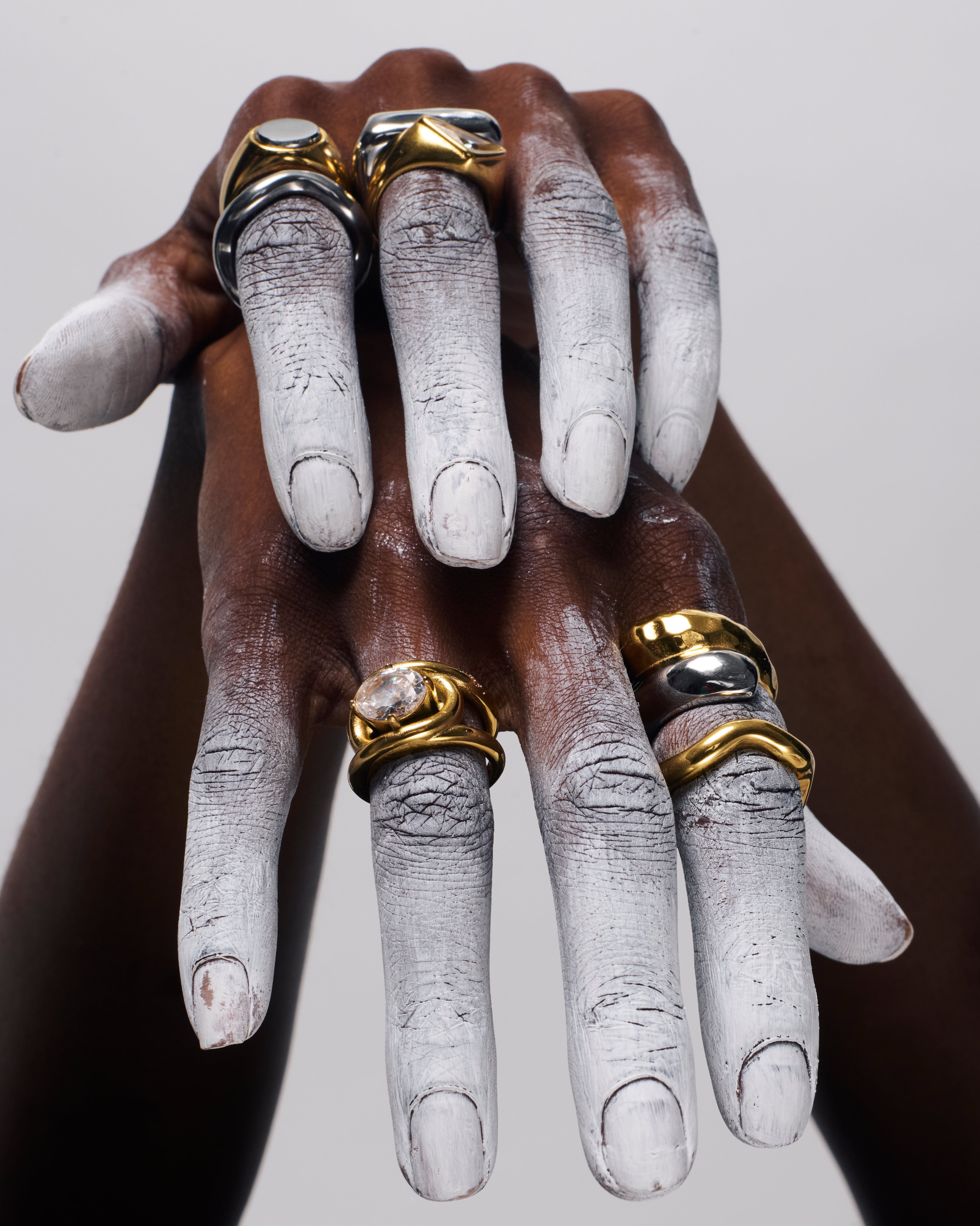 GRISÉ NYC oval gemstone gold statement ring styled on hand with sculptural 18k gold plated finish