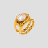 GRISÉ NYC gold statement ring with oversized oval crystal stone on light grey background