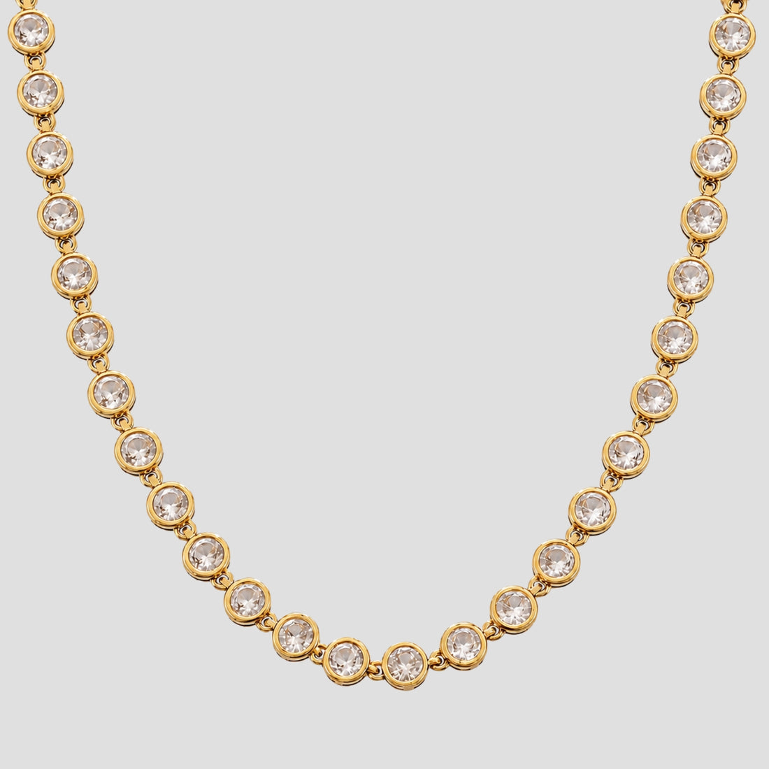 GRISÉ NYC Royal Bezel Gemstone Necklace 2.0 in 18K gold plated stainless steel with bezel-set clear cubic zirconia stones.