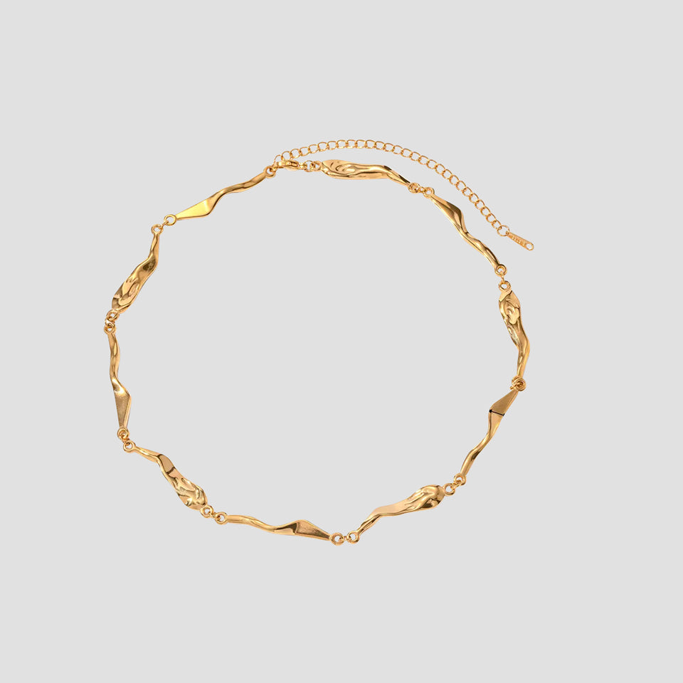 Full view of GRISÉ NYC rugged textured gold necklace chain