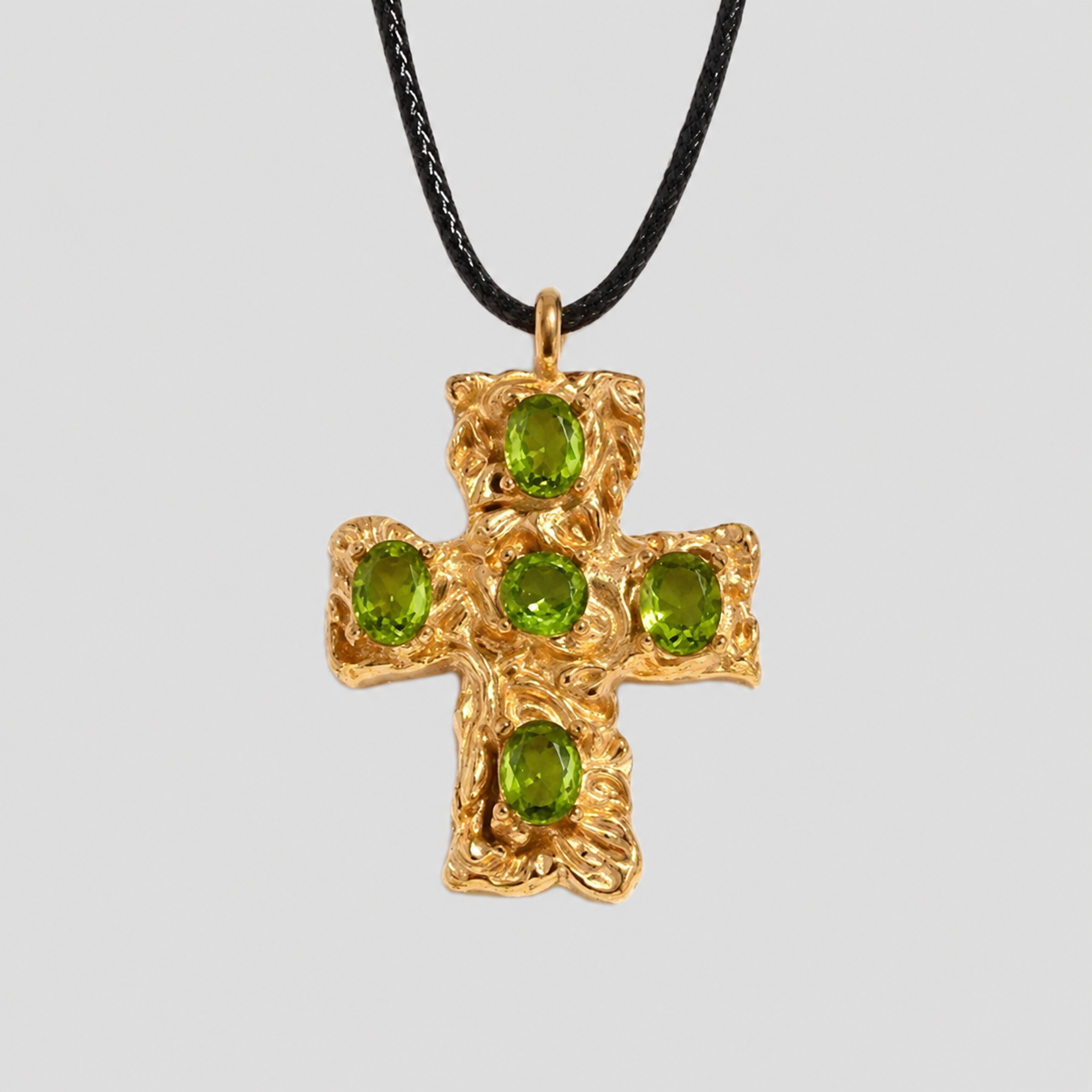 GRISÉ NYC rugged cross pendant necklace with kiwi gemstone accents, hammered gold texture.