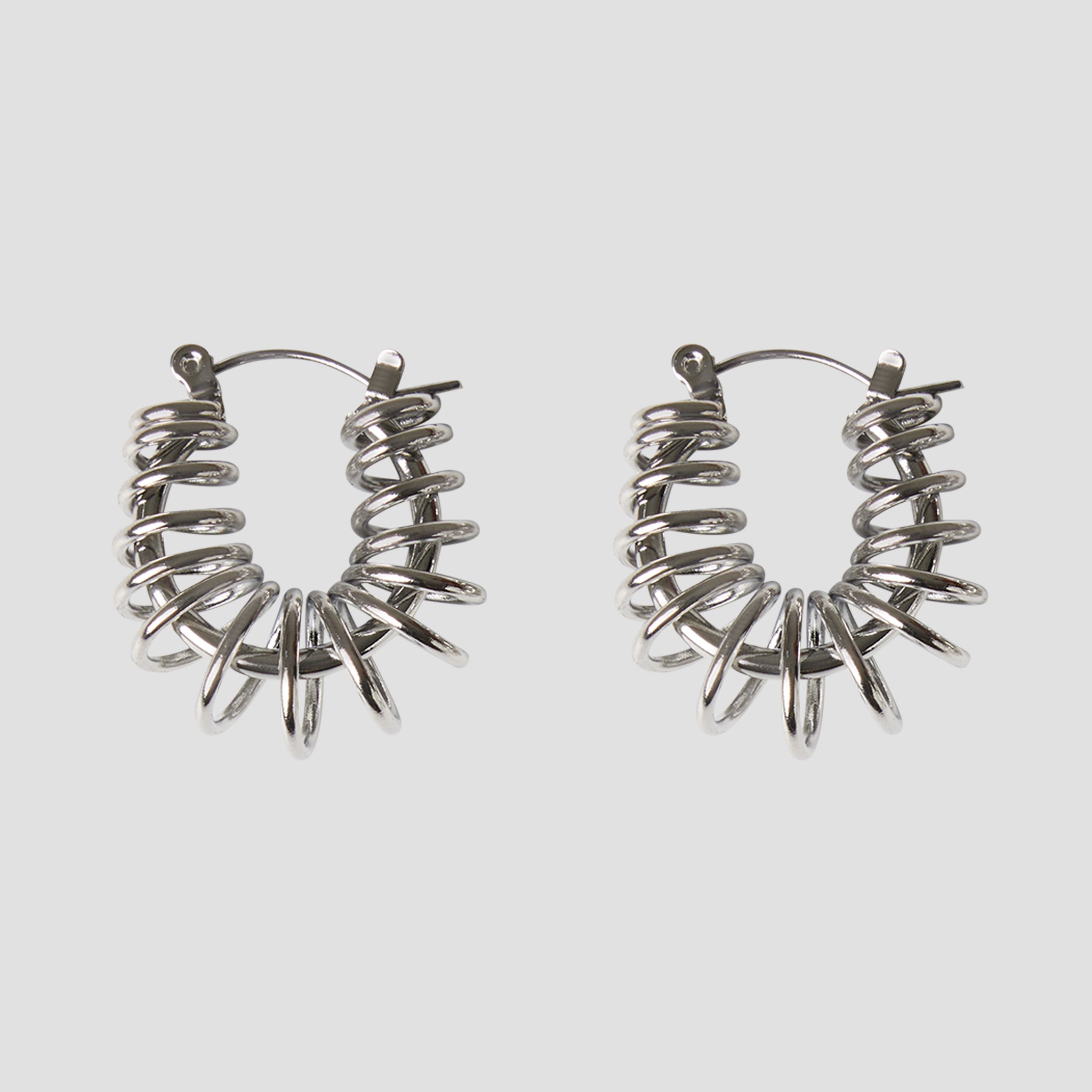 GRISÉ NYC silver barbed wire hoop earrings in stainless steel front view
