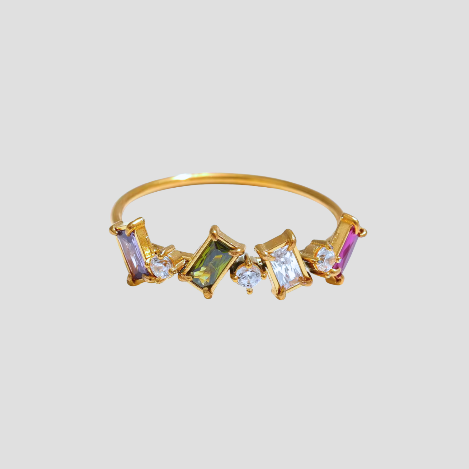 Treasure Gems Crown Ring in 18k gold plated stainless steel featuring colorful cubic zirconia gemstones in a crown-inspired design by GRISÉ NYC.