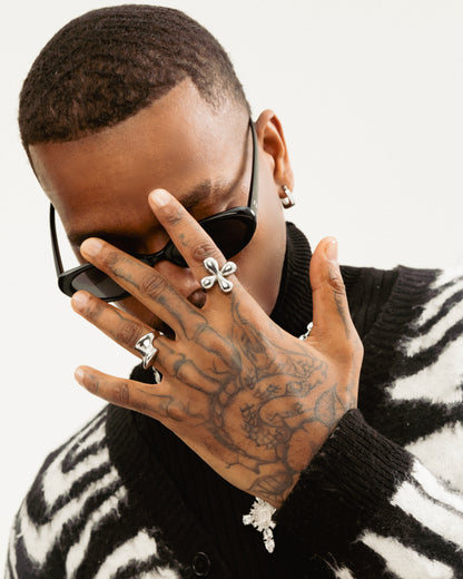 Oversized unisex stainless steel flower ring in silver, bold sculptural statement ring by GRISÉ NYC.