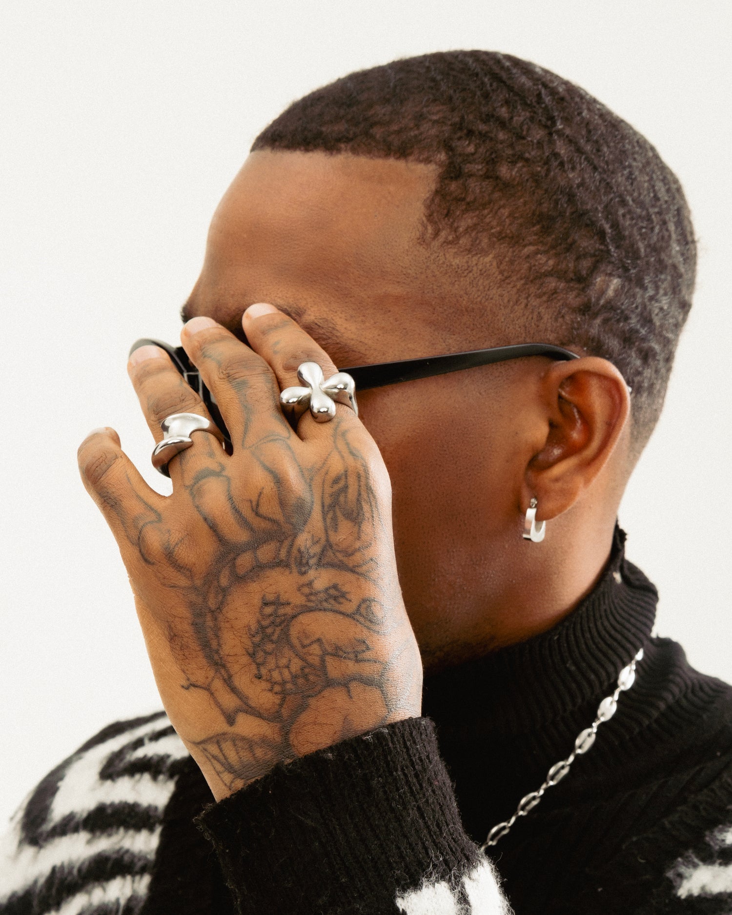 Oversized stainless steel flower ring in silver, bold sculptural statement ring by GRISÉ NYC.