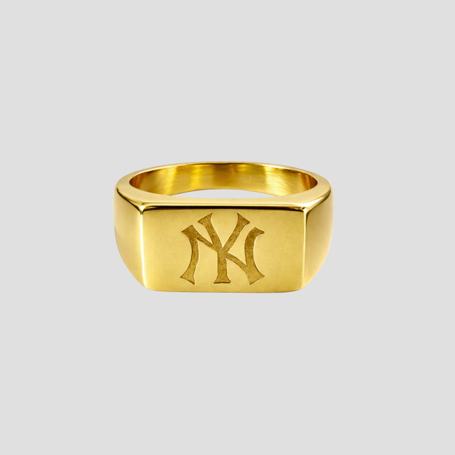 GRISÉ NYC Yankees signet ring in 18k gold plated stainless steel with engraved NY logo front view.