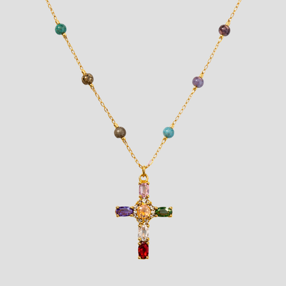 Multicolor gemstone cross pendant beaded gold necklace by GRISÉ NYC featuring colorful stones and delicate gold chain.