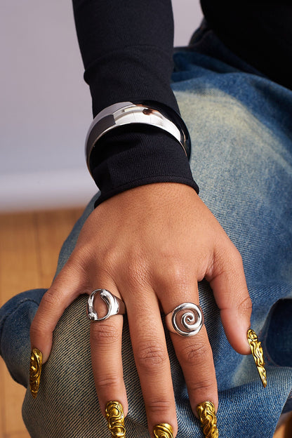 Close up of yin yang stainless steel ring symbolic statement jewelry GRISÉ NYC.