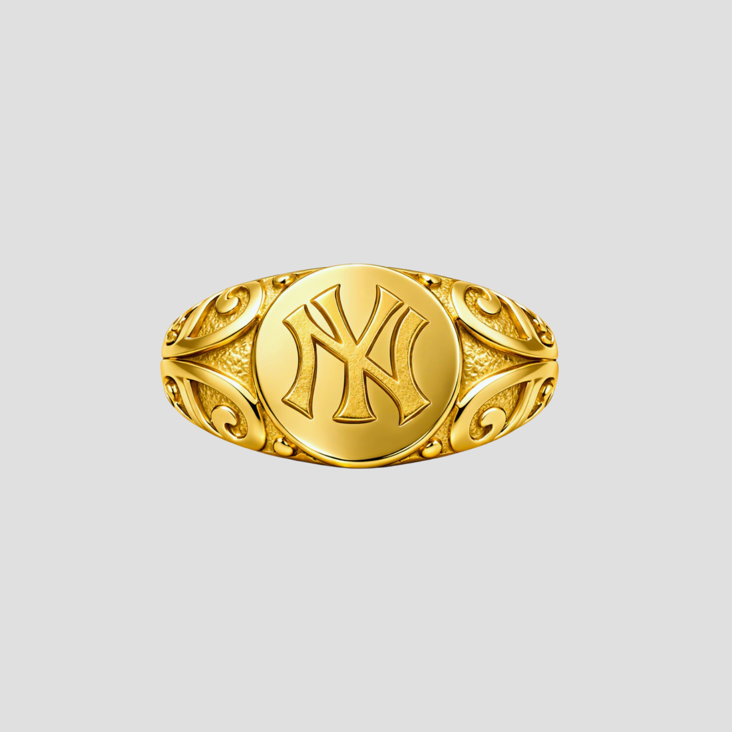 Vintage Yankees signet ring in 18k gold plated stainless steel by GRISÉ NYC featuring engraved NY logo and ornate side detailing.