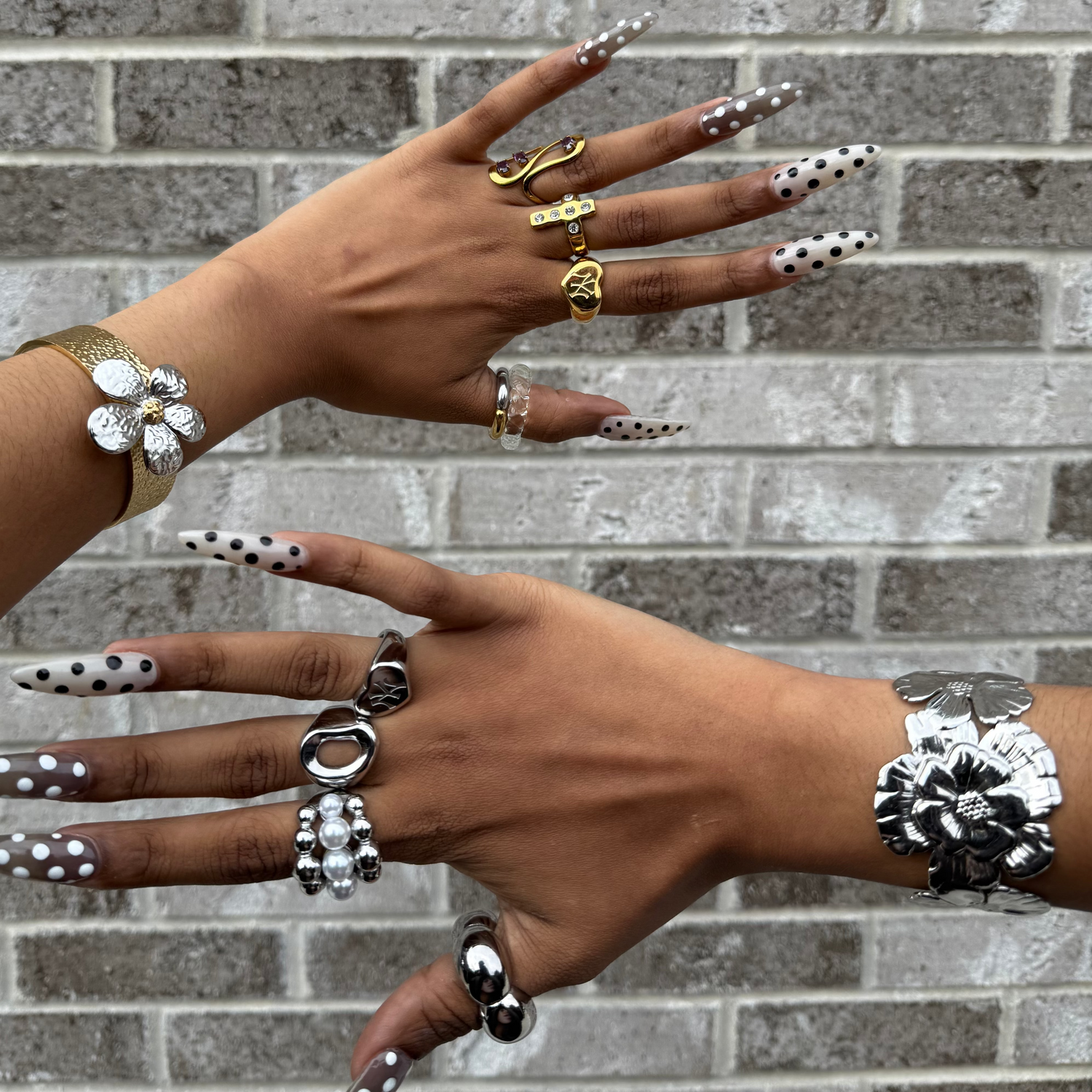 Gold stainless steel Yankees heart signet ring by GRISÉ NYC worn on hand, New York inspired statement jewelry.