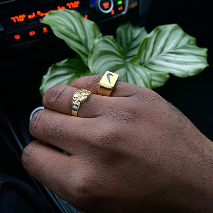 Close up of Just Do It 18k gold plated stainless steel signet ring by GRISÉ NYC