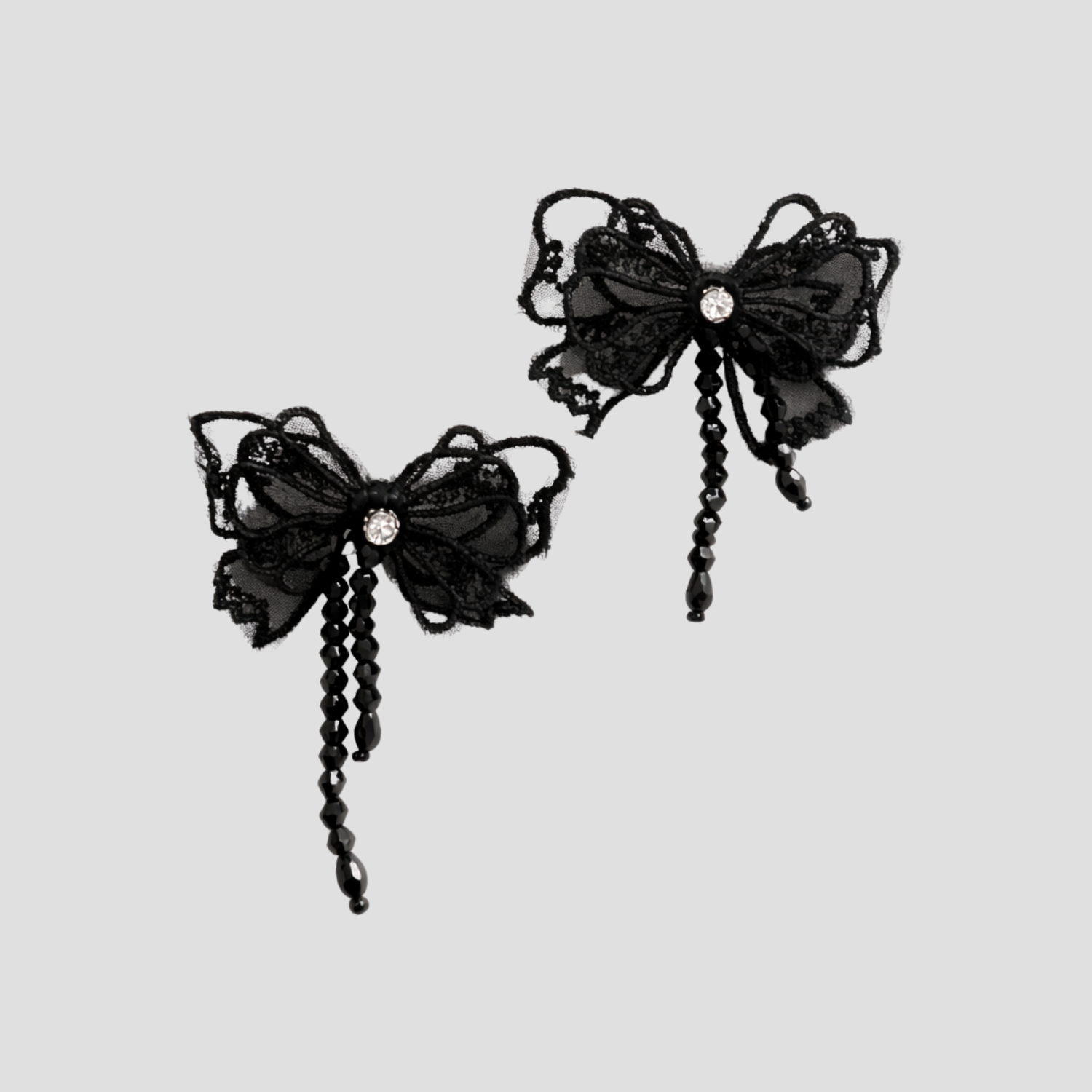 Luxury black bow sneaker accessories with crystal details GRISÉ NYC.