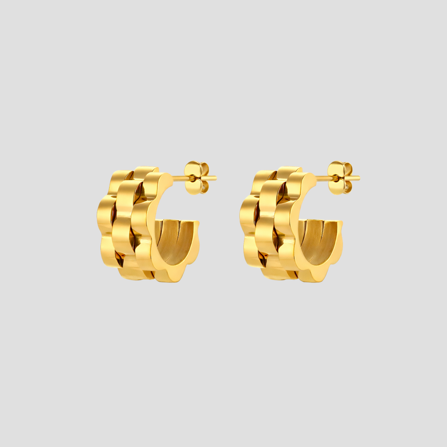 Midi Jubilee Link 18k gold plated hoop earrings by GRISÉ NYC.