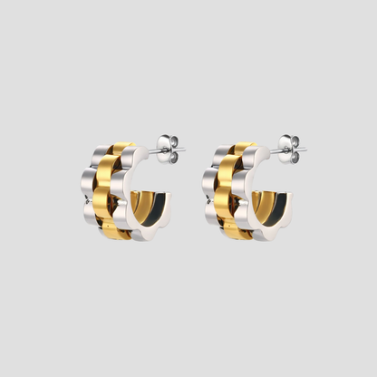 Midi Jubilee Link 2 tone hoop earrings in silver and 18k gold by GRISÉ NYC.