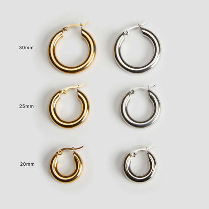 Size comparison guide showing 20 mm, 25 mm, and 30 mm 18K gold and stainless steel mini hoop earrings by GRISÉ NYC.