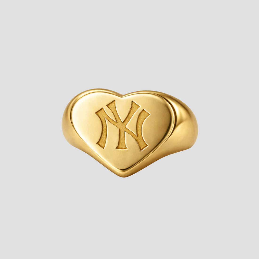 Puffed heart shaped New York Yankees signet ring in silver by GRISÉ NYC with rounded edges and engraved NY logo.