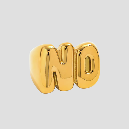 Close-up of the NO Letter 18k Gold Ring by GRISÉ NYC featuring bold bubble-style lettering in a polished gold finish.