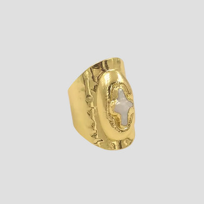 GRISÉ NYC Perlita Cross 18k Gold Ring featuring a hammered gold band and mother-of-pearl cross centerpiece.