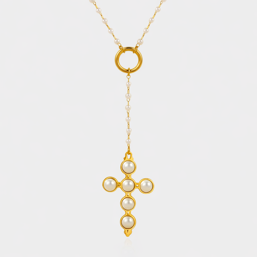Perlita Rosary 18k gold cross pendant necklace with pearl accents and circular lariat detail by GRISÉ NYC on white background.