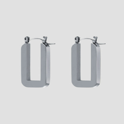 Rectangle stainless steel hoop earrings by GRISÉ NYC in high polish silver with bold geometric open rectangular design.