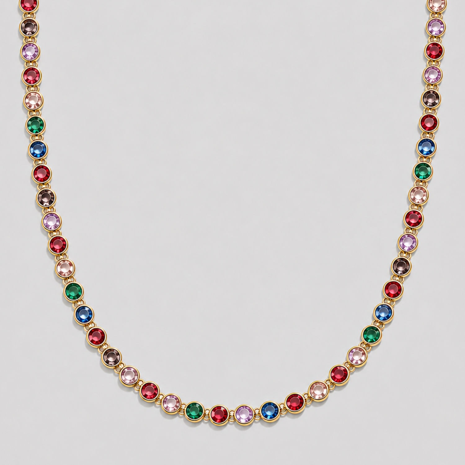 Royal Multicolor Gemstone Necklace 2.0 in 18k gold plated stainless steel with vibrant rainbow cubic zirconia stones on gray background