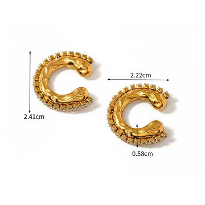 Rugged pavé 18k gold ear cuff set by GRISÉ NYC with textured sculptural design and sparkling cubic zirconia accents.