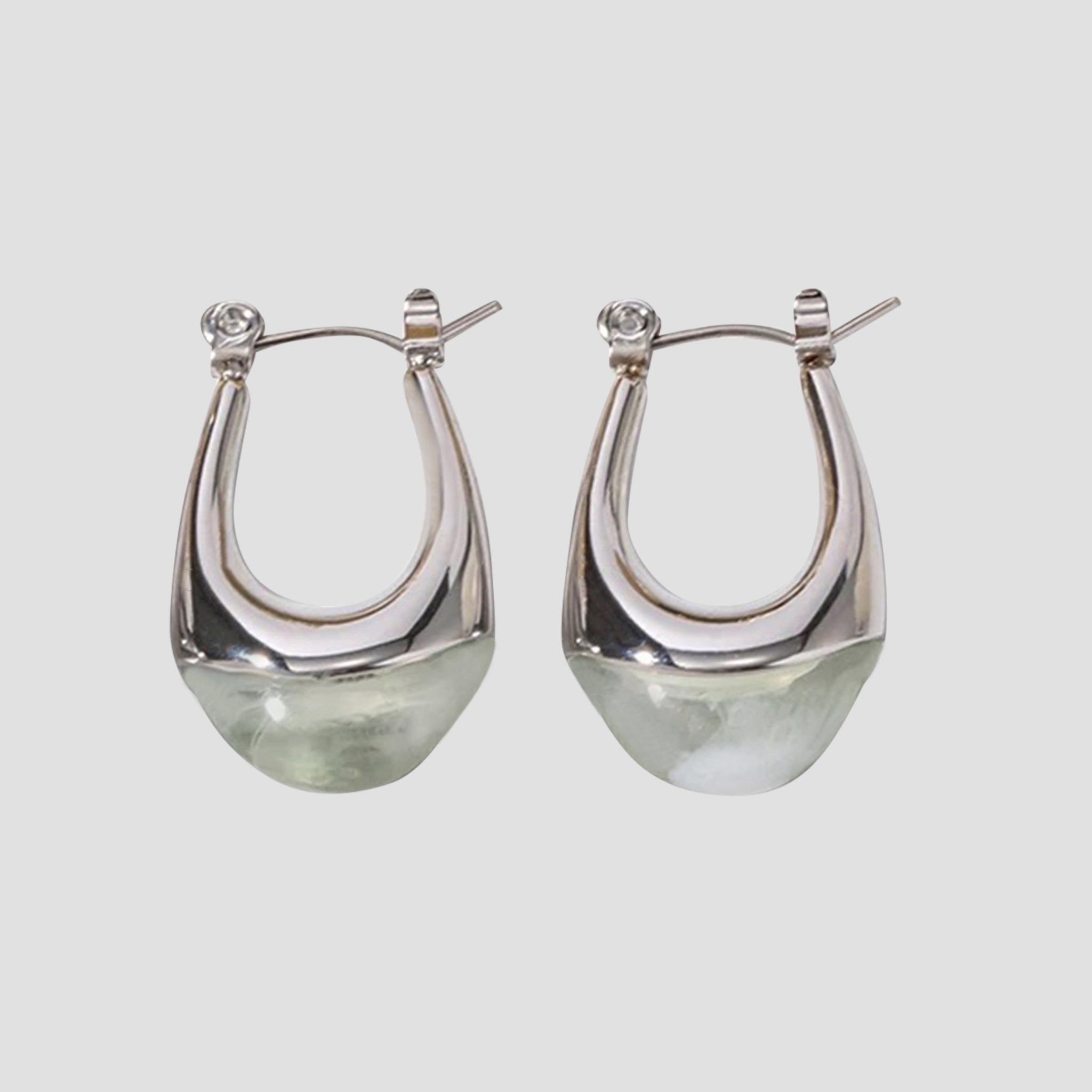 Sage resin oval stainless steel drop earrings by GRISÉ NYC with sculptural teardrop silhouette and silver hardware.