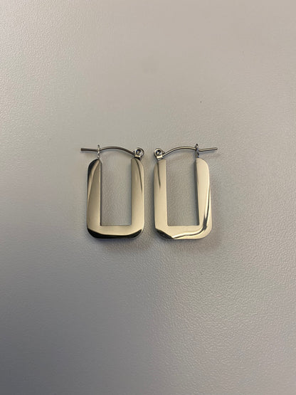 Stainless Steel rectangle hoop earrings by GRISÉ NYC in high polish stainless steel with modern geometric silhouette.