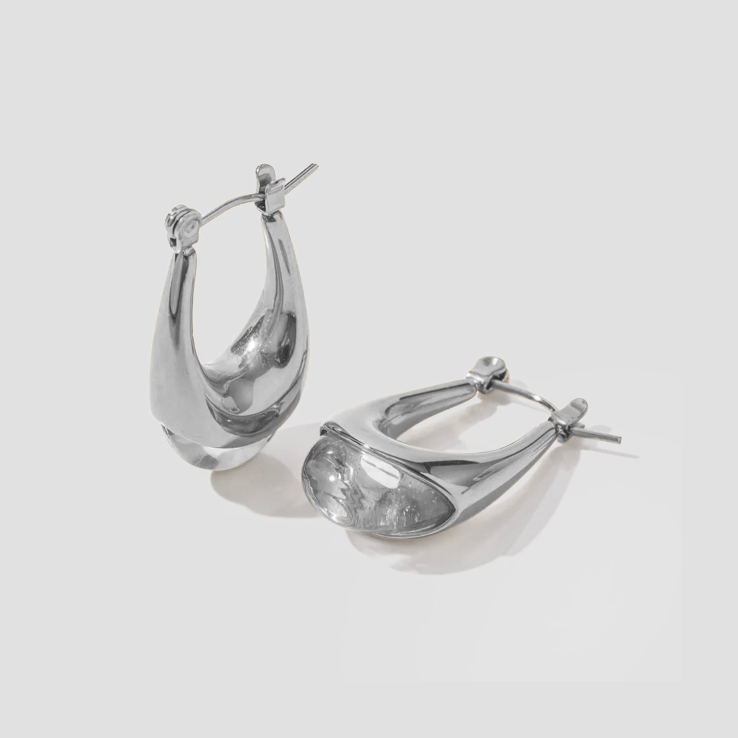 Resin Oval Earrings by GRISÉ NYC. Vintage inspired teardrop earrings with stainless steel hardware and modern sculptural silhouette.