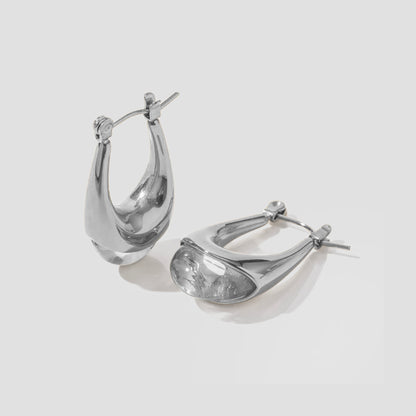 Resin Oval Earrings by GRISÉ NYC. Vintage inspired teardrop earrings with stainless steel hardware and modern sculptural silhouette.