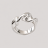 Twist Silver Ring by GRISÉ NYC featuring a sculptural twisted silver plated design on a light grey background 