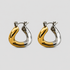 Pair of two-tone trapezoid twist hoop earrings featuring polished 18K gold-plated and stainless steel finishes by GRISÉ NYC.